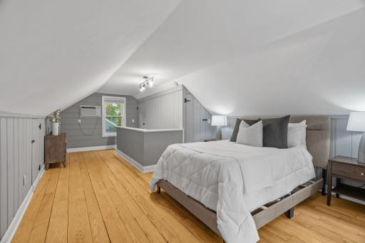 The sitting room near the stairs is an ideal work space.