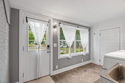Another point of entry from the front and direct access from the attached garage.