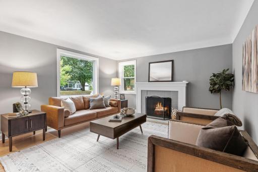 The large living room with hardwood floors provides ample room for gathering.