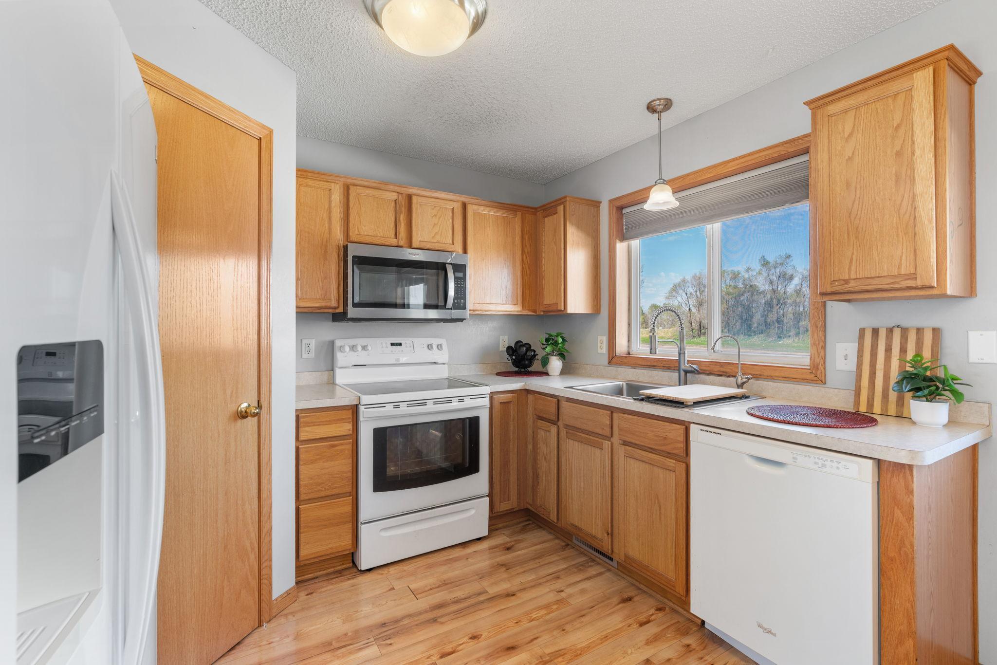 Kitchen with updated sink and microwave