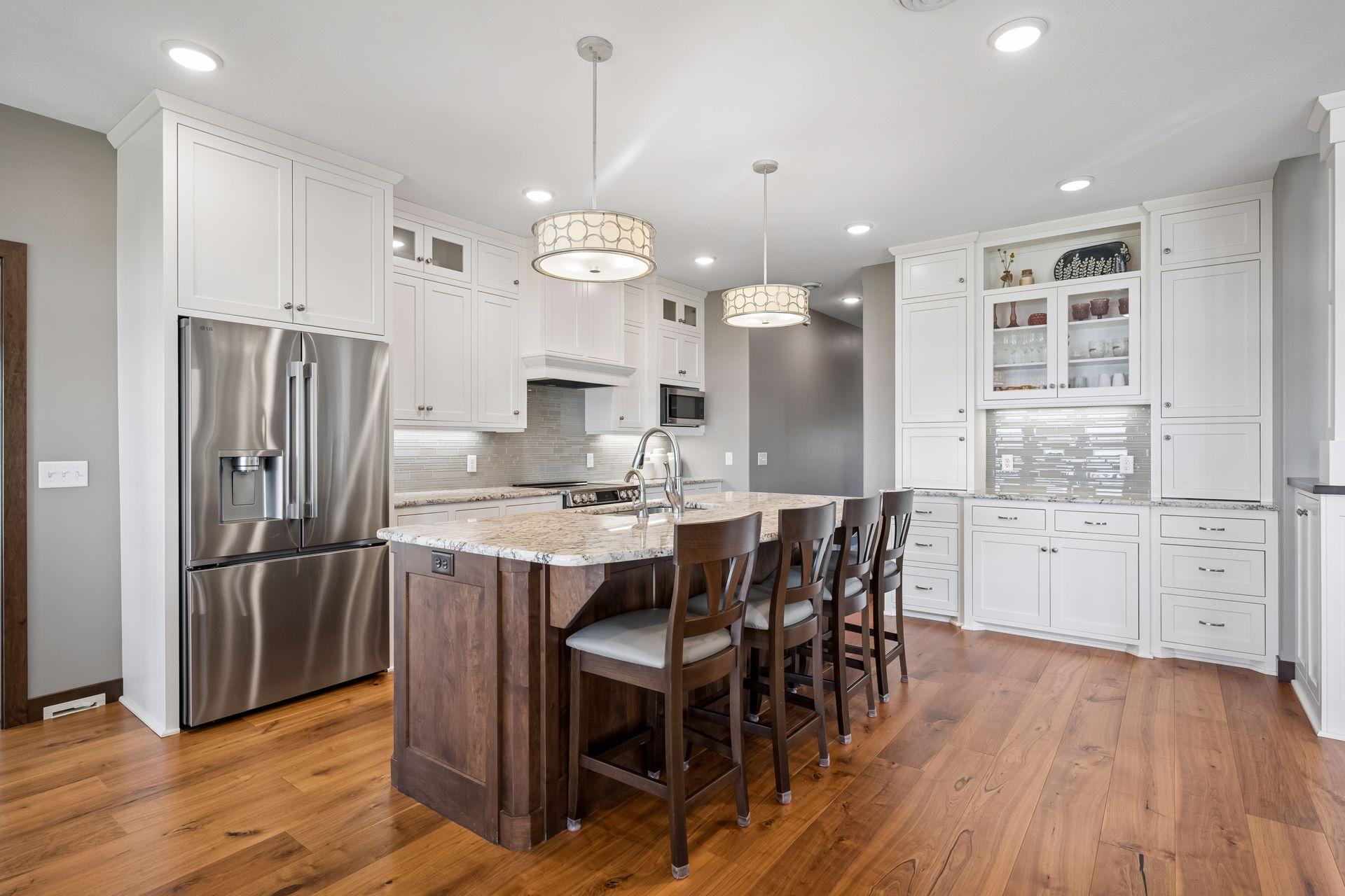 Spacious Kitchen with Stainless Steel Appliances & Oversized Center Island