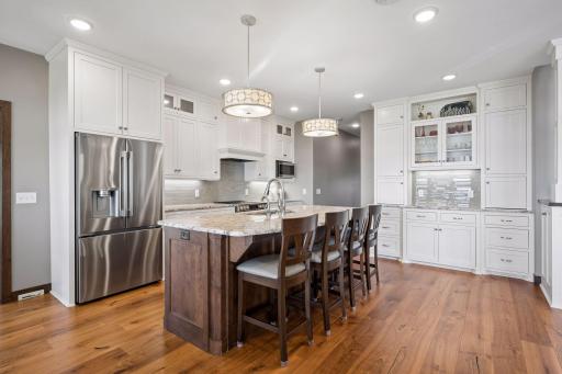 Spacious Kitchen with Stainless Steel Appliances & Oversized Center Island