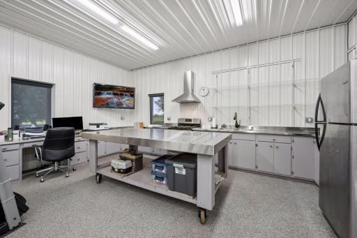 Detached Garage Featuring a Full Kitchen & Convenient Half Bath