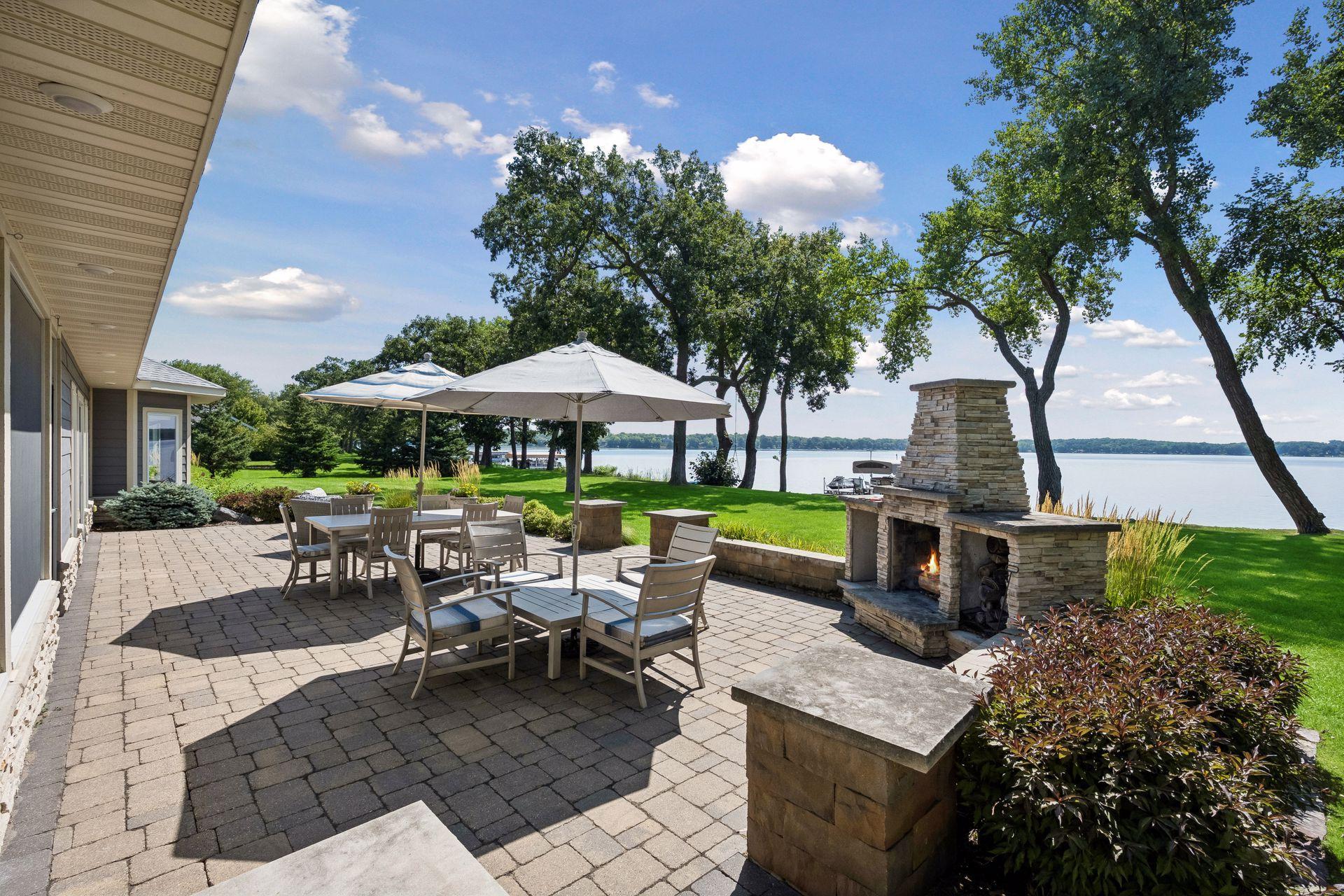 Expansive Patio with Inviting Wood-Burning Fireplace