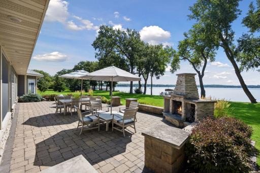 Expansive Patio with Inviting Wood-Burning Fireplace
