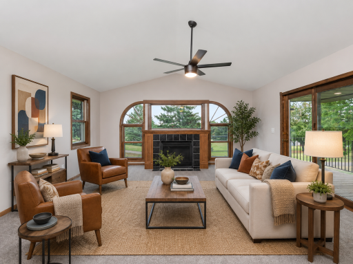 Family Room - AI virtually staged to help buyers visualize the space.