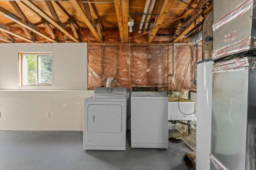 Washer & dryer included. Handy laundry tub.