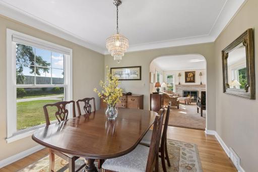 Beautiful, original, wood flooring is found in the dining room