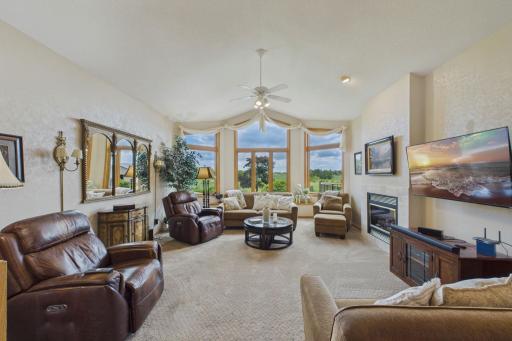 Kick back & relax in the living room with see thru gas fireplace