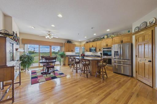 Beautiful cabinets, granite, pantry huge center island and fireplace