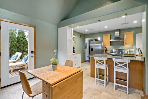 The open flow from kitchen to dining to deck makes this space as functional as it is beautiful - perfect for everyday living and easy entertaining.