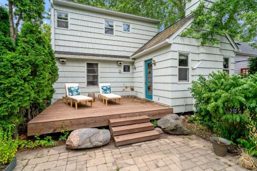 Step out from the vaulted great-room onto the deck overlooking your private backyard. Summer living at its best.