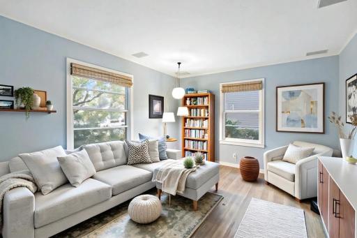 A bright, easy-living space with hardwood floors and a floor plan that flows effortlessly throughout.