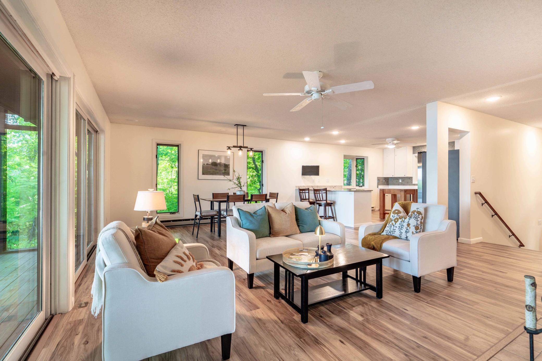 Open concept casual living leading to dining and kitchen.