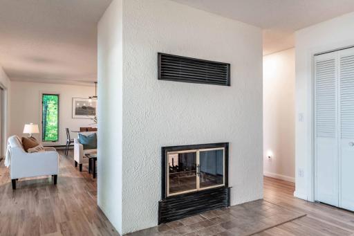 Detail on the fireplace includes a operable fan to warm the whole area