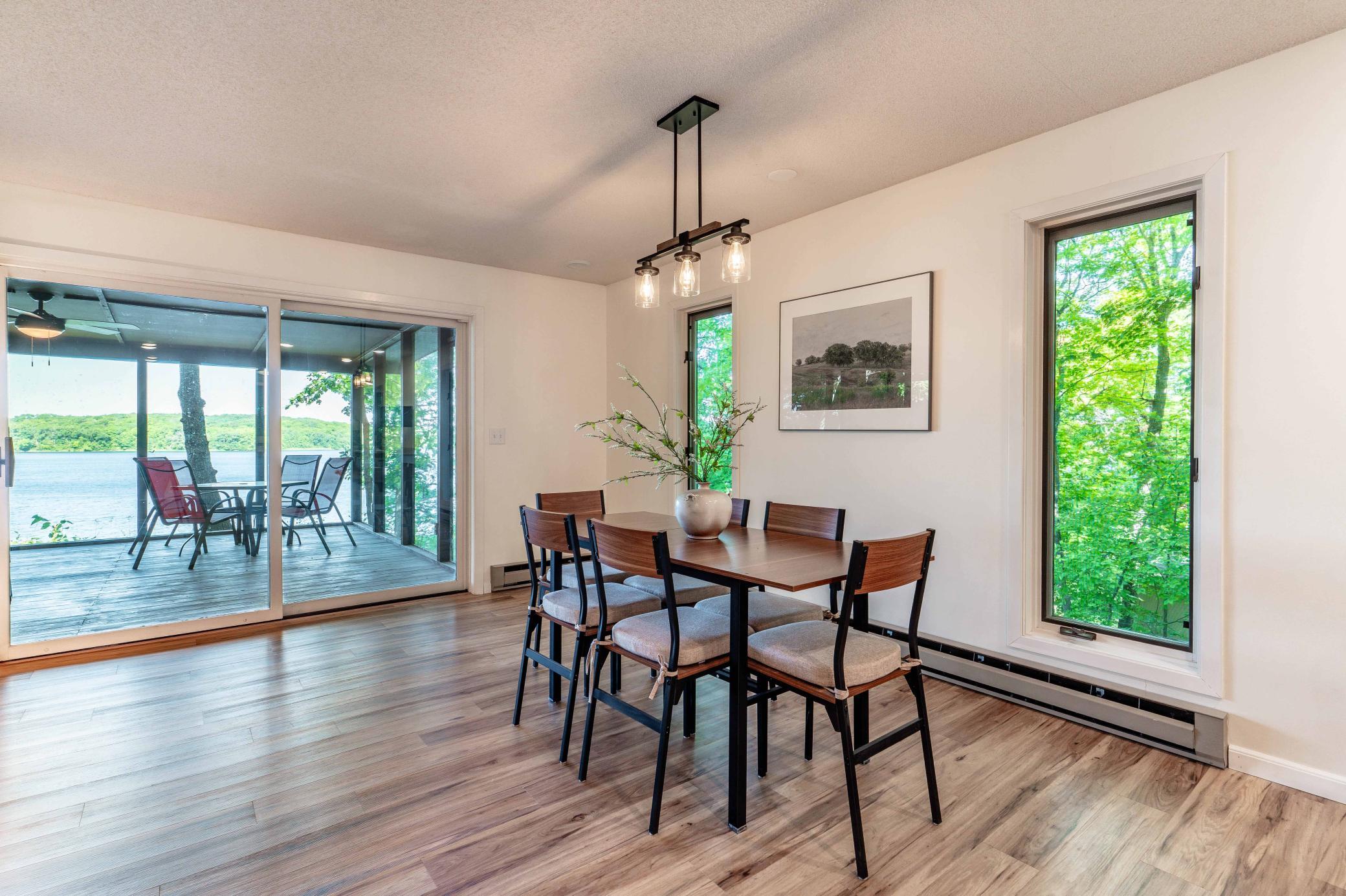 Informal dining is spacious for a large dining set
