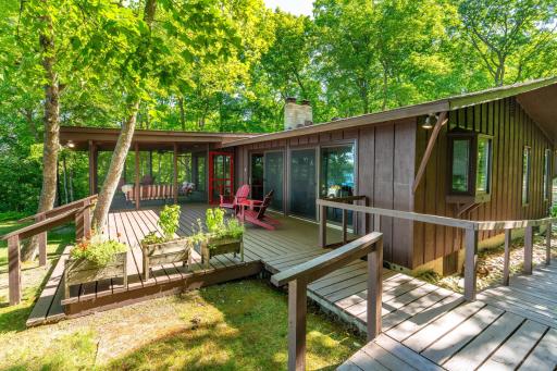 Relax in the screen porch OR on your spacious deck system.