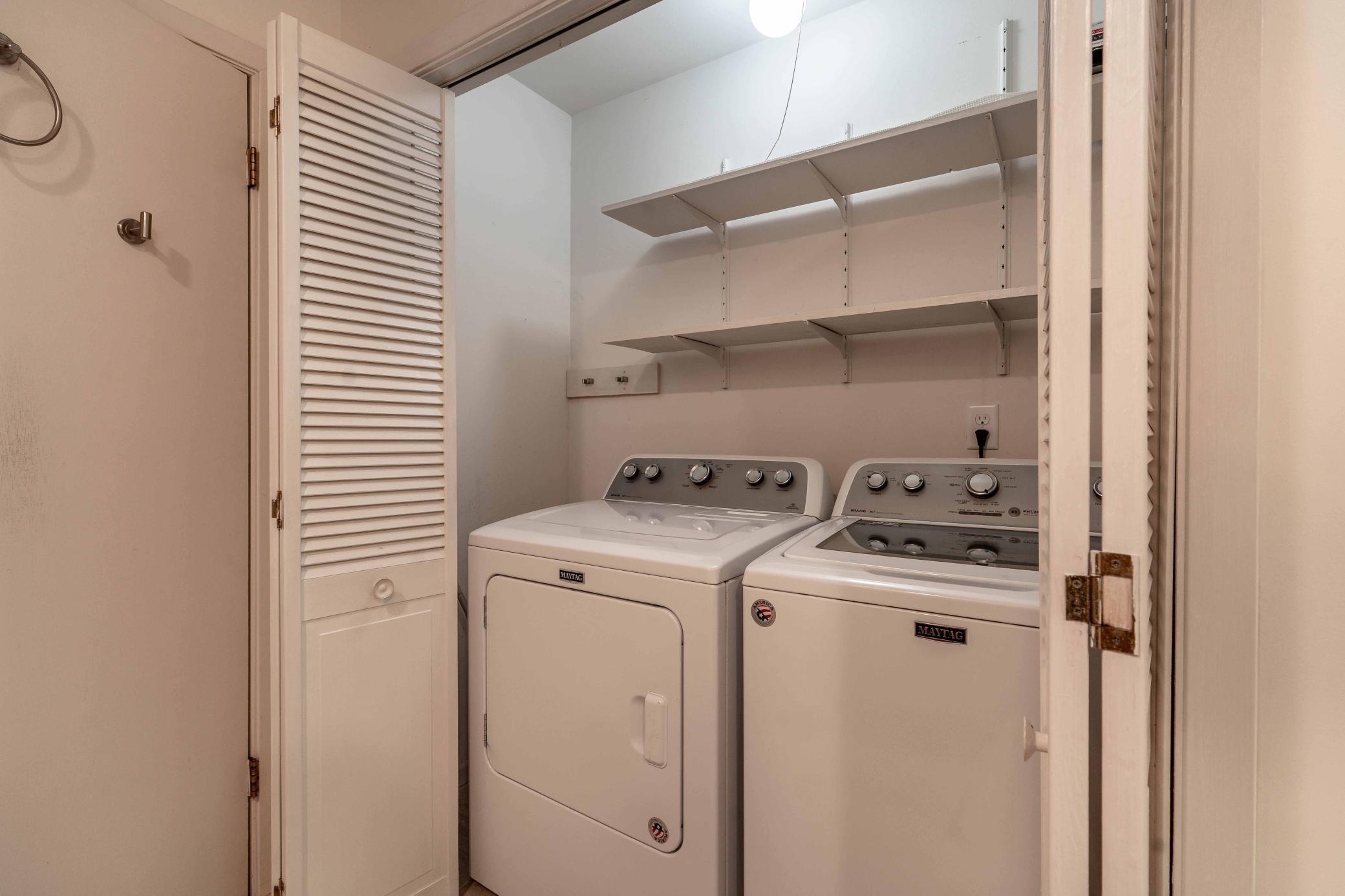 Laundry is conveniently located in the upper level bathroom.