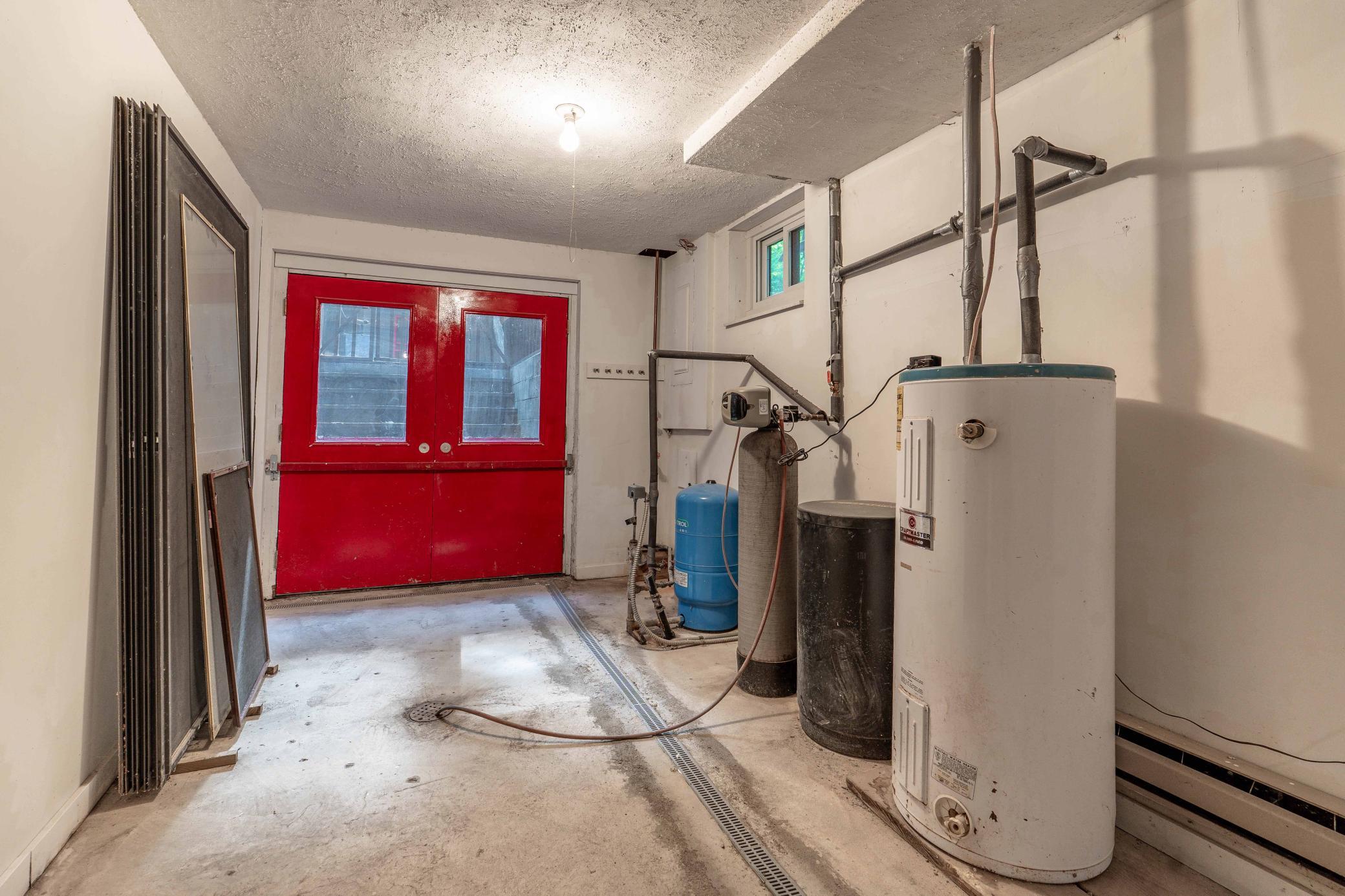 Lower Level workshop/utility room with exterior access