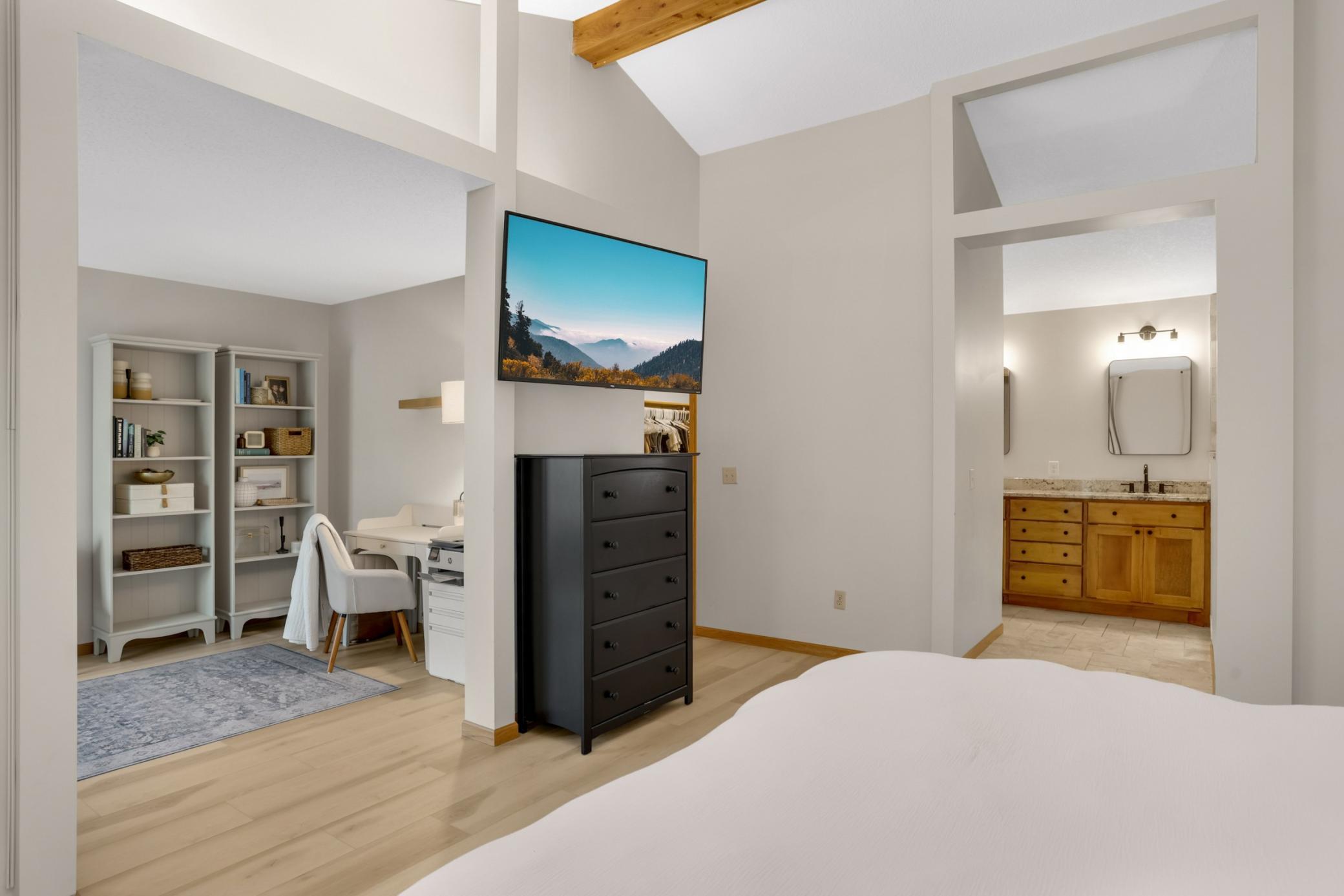 This spacious owner's suite has an attached bonus room!