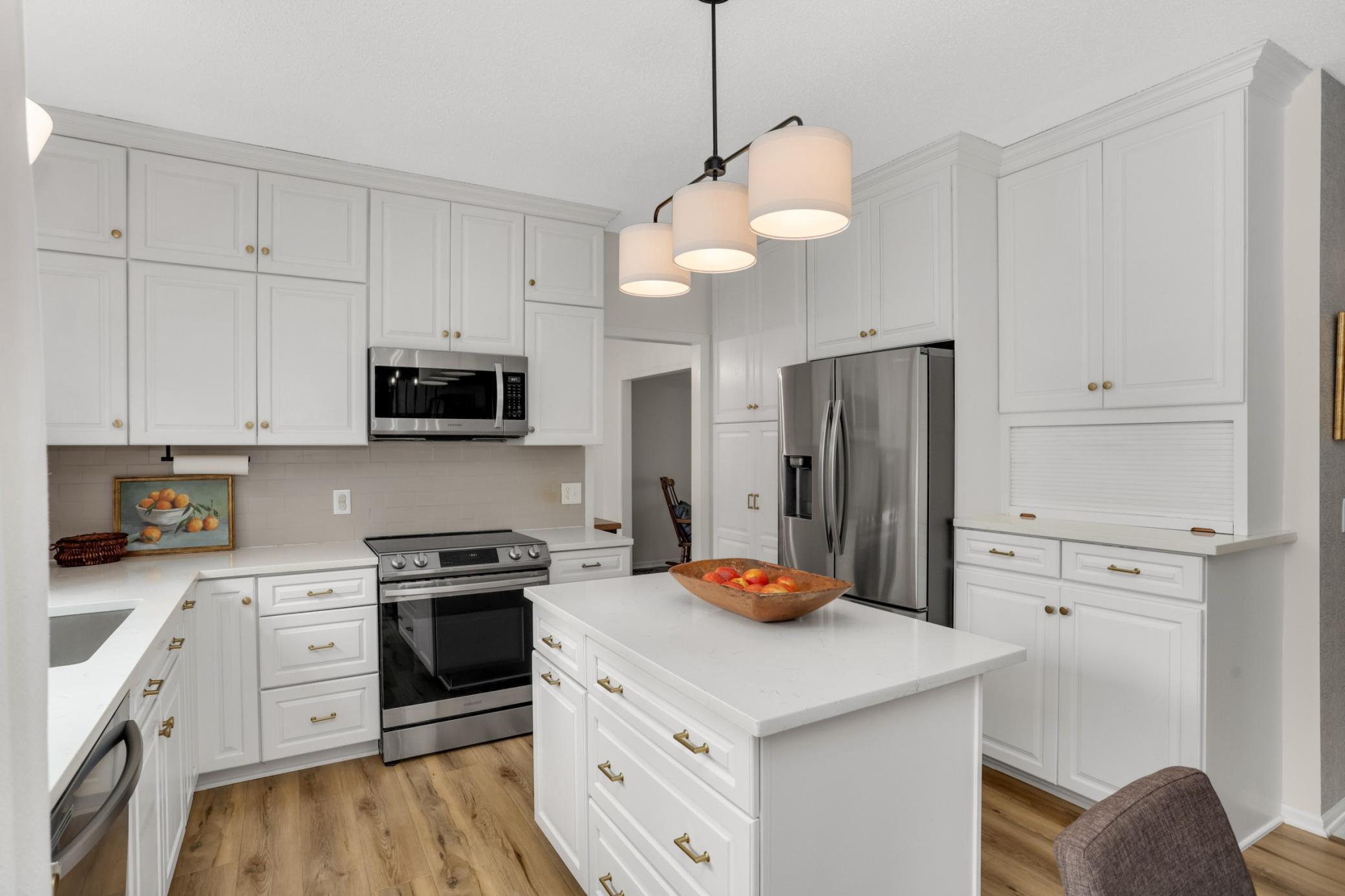 Center island, great for the cooks in the house! Don't miss all of the storage!