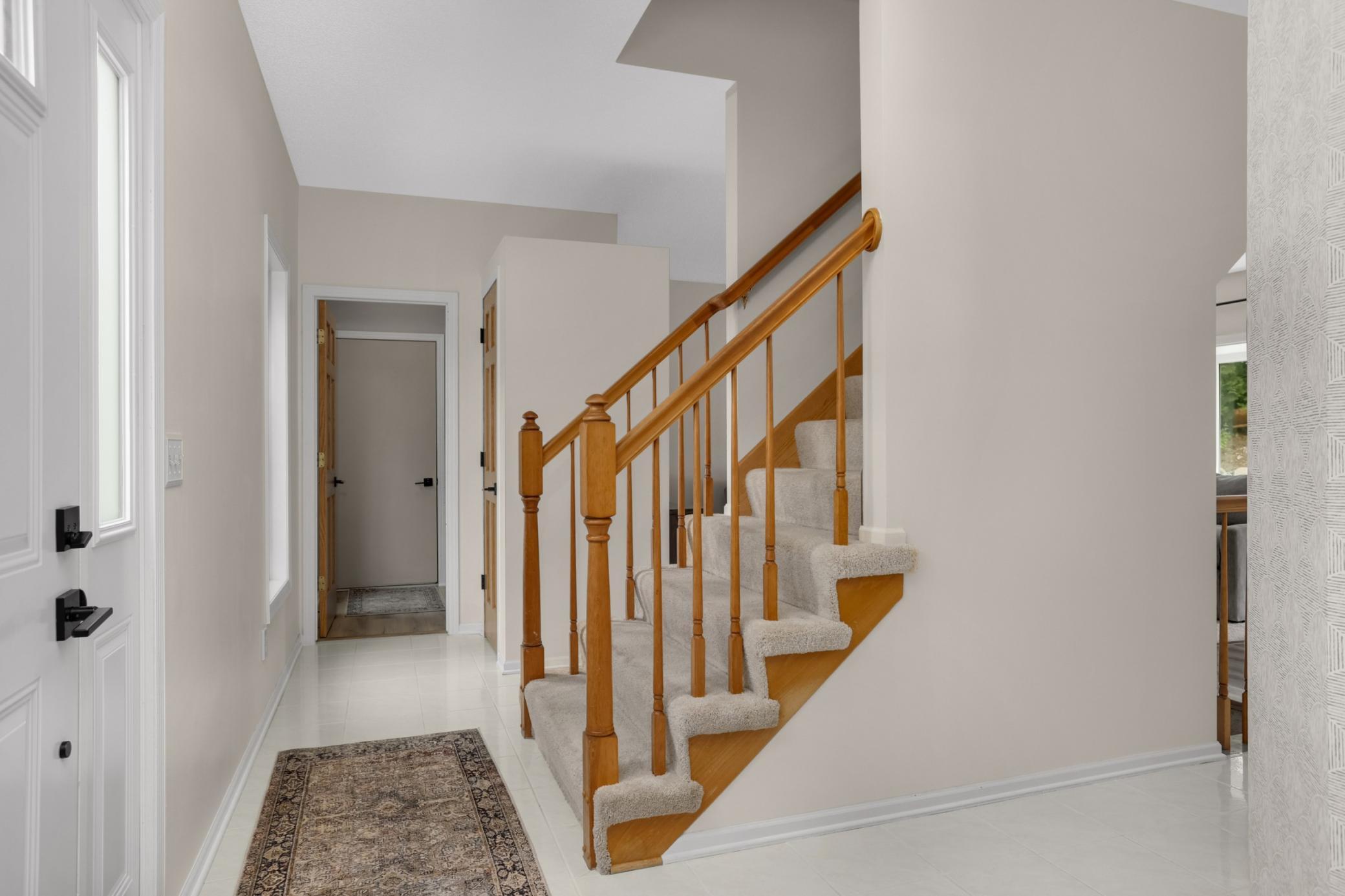 Up the stairs to the private sleeping rooms.