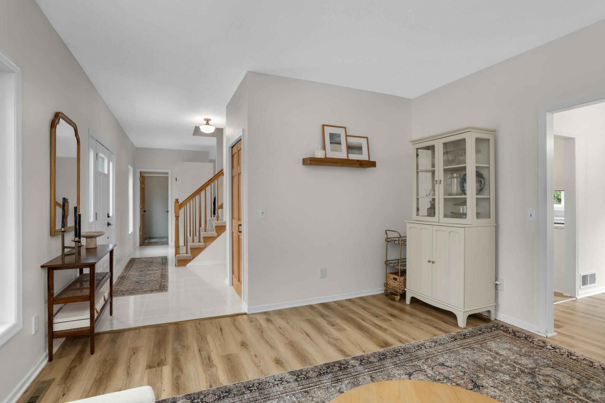 A welcoming entry with adjacent coat closet, great for guests.