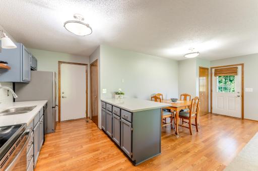 Door on the right in the kitchen is pantry/storage.