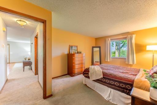 Primary bedroom is large enough for a king bed.