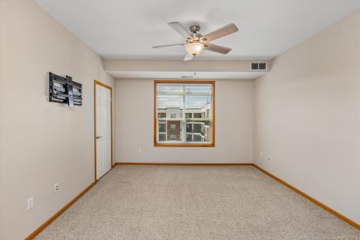 The comfortable bedroom provides plenty of space and natural light, creating a relaxing place to unwind.