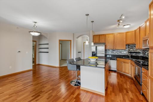 The well-maintained interior combines comfortable living spaces with the convenience of low-maintenance condo living.