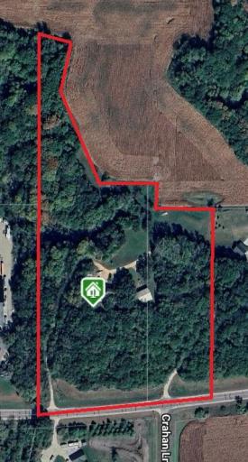 Approximate Property Boundary. There are two property ID numbers and two driveways to the home.