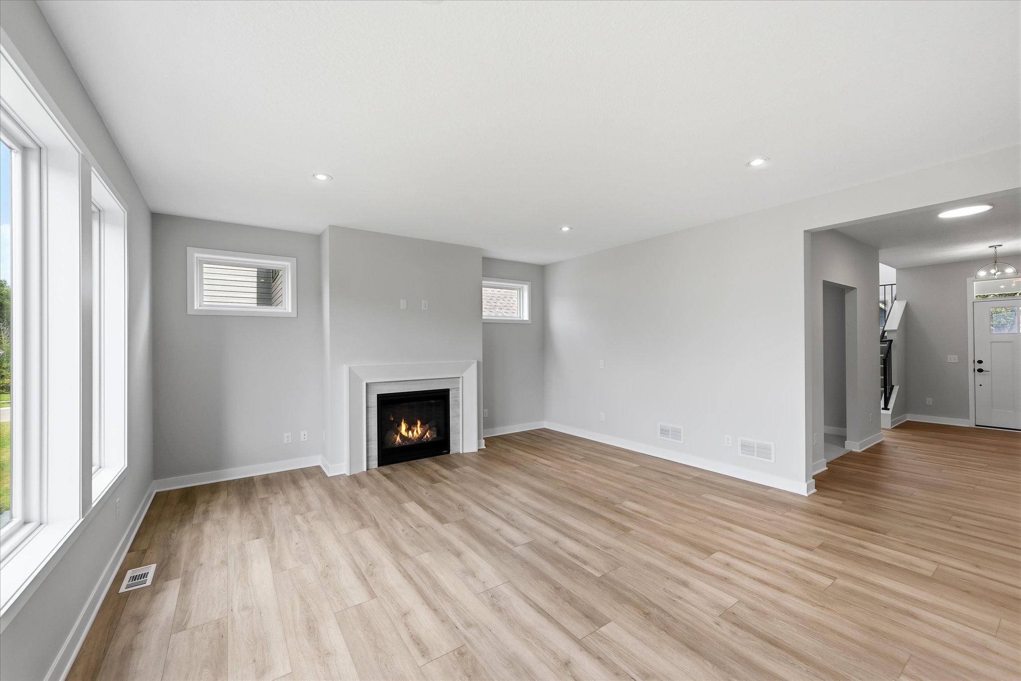 Open concept living room with gas fireplace!