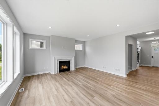 Open concept living room with gas fireplace!