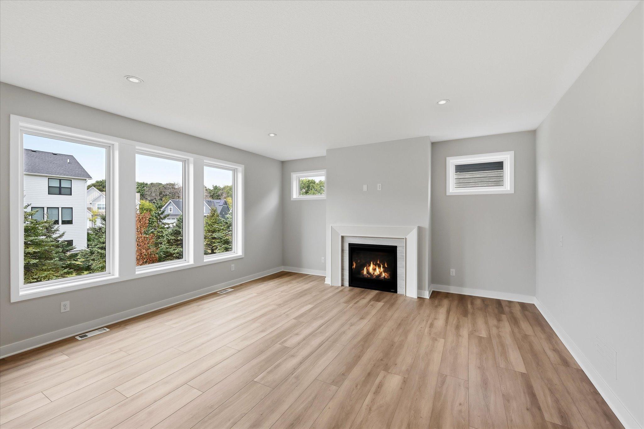 Open concept living room with gas fireplace!