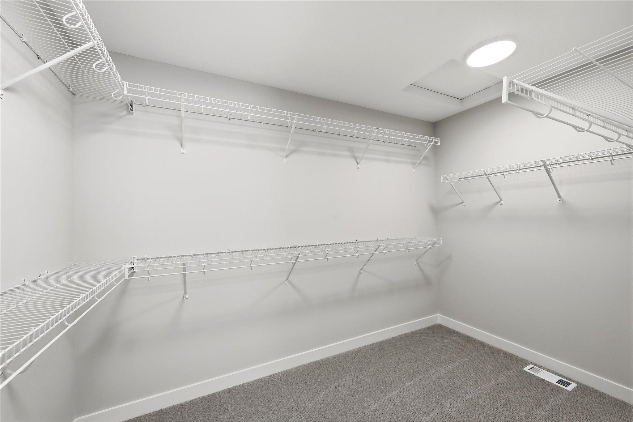 His and hers closets primary bedroom