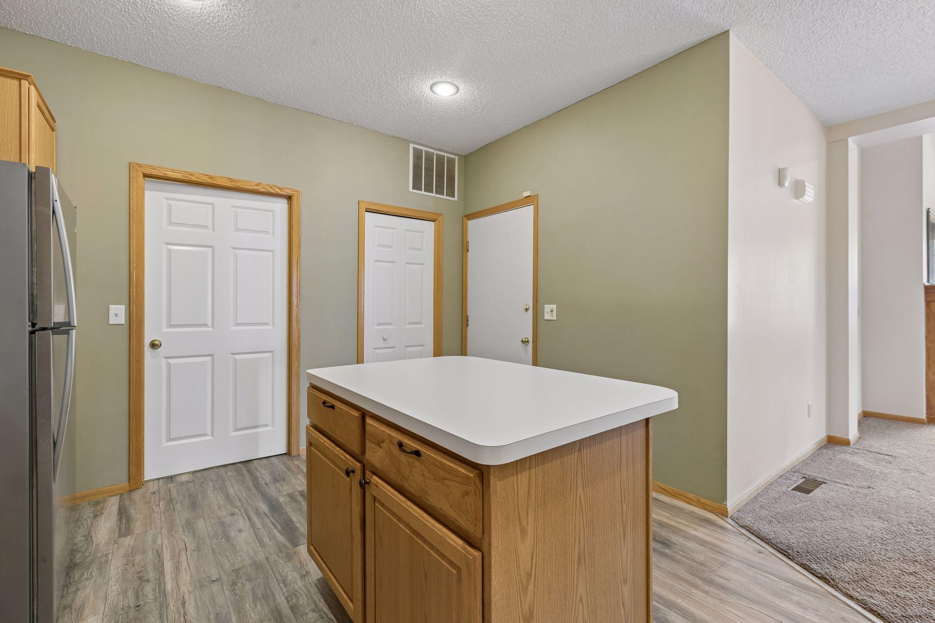 The third door on the right leads to the two car garage.