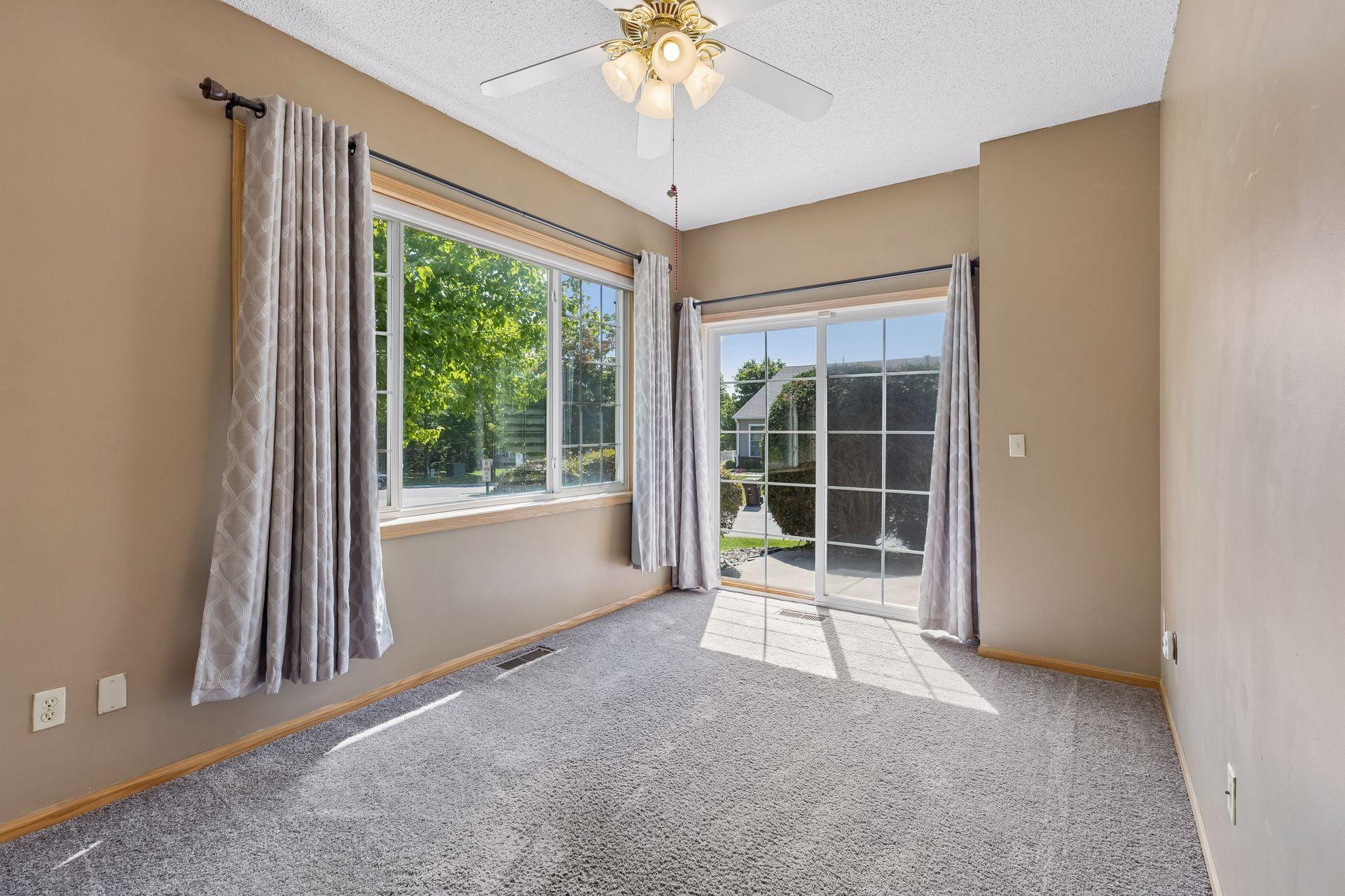 Another view of the sunroom that shows wall space for furniture and art. This will be your favorite room!