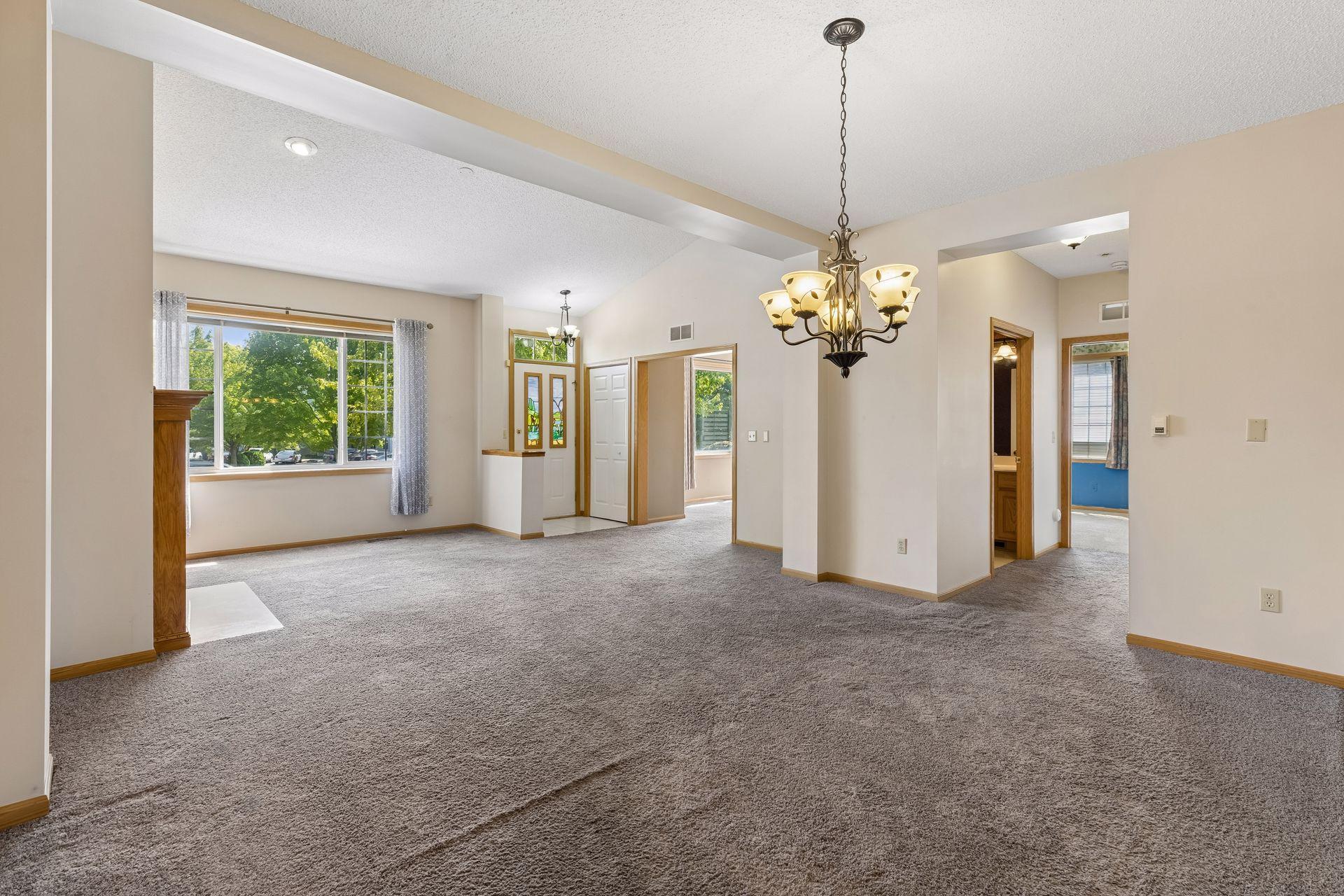 To the right is the opening to the sleeping area where there are two bedrooms. The first open door is a 3/4 bath.