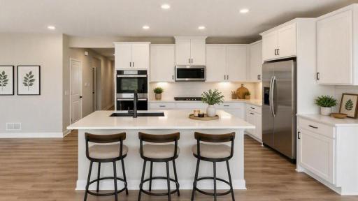 Kitchen island provides additional seating.