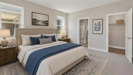 Spacious primary suite with private bath and walk-in closet.