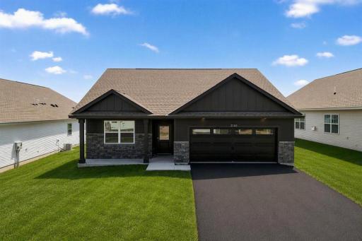 The Harmony offers a a covered front porch for outdoor enjoyment. Landscape pkg also included.