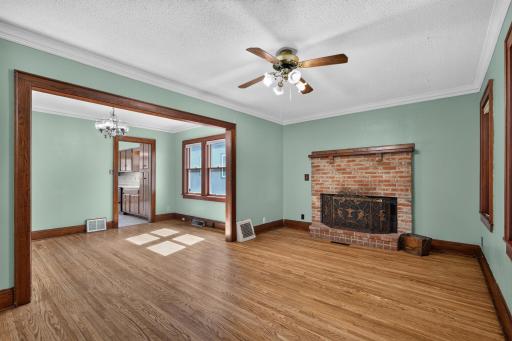 Walking into the home from the front door and looking into the main living area