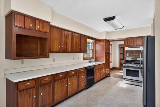 Original wood work and bronze labels on the cabinetry