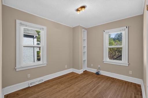 bonus room/ office leading to the upstairs bedroom
