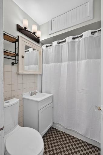 Bathroom with high efficiency toilet