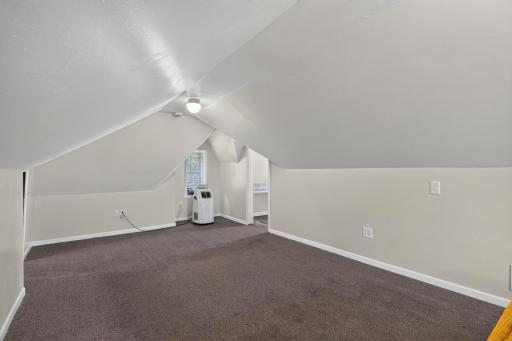 Walking past the stairs through the upstairs bedroom, possible 2nd bath could be added in 1 of the 2 closets
