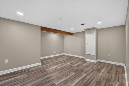 Downstairs entertainment room with egress window, could be used as 3rd bedroom