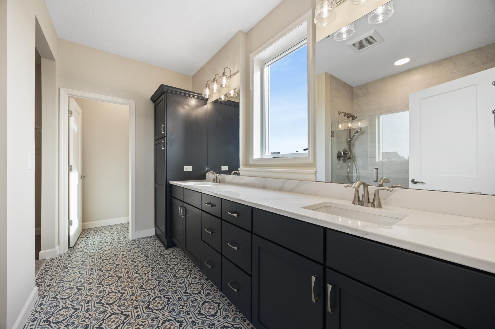Owner's ensuite in a similar home. Lovely natural light flows in from the window