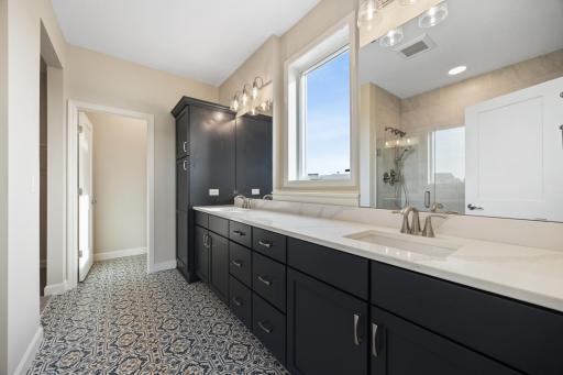 Owner's ensuite in a similar home. Lovely natural light flows in from the window